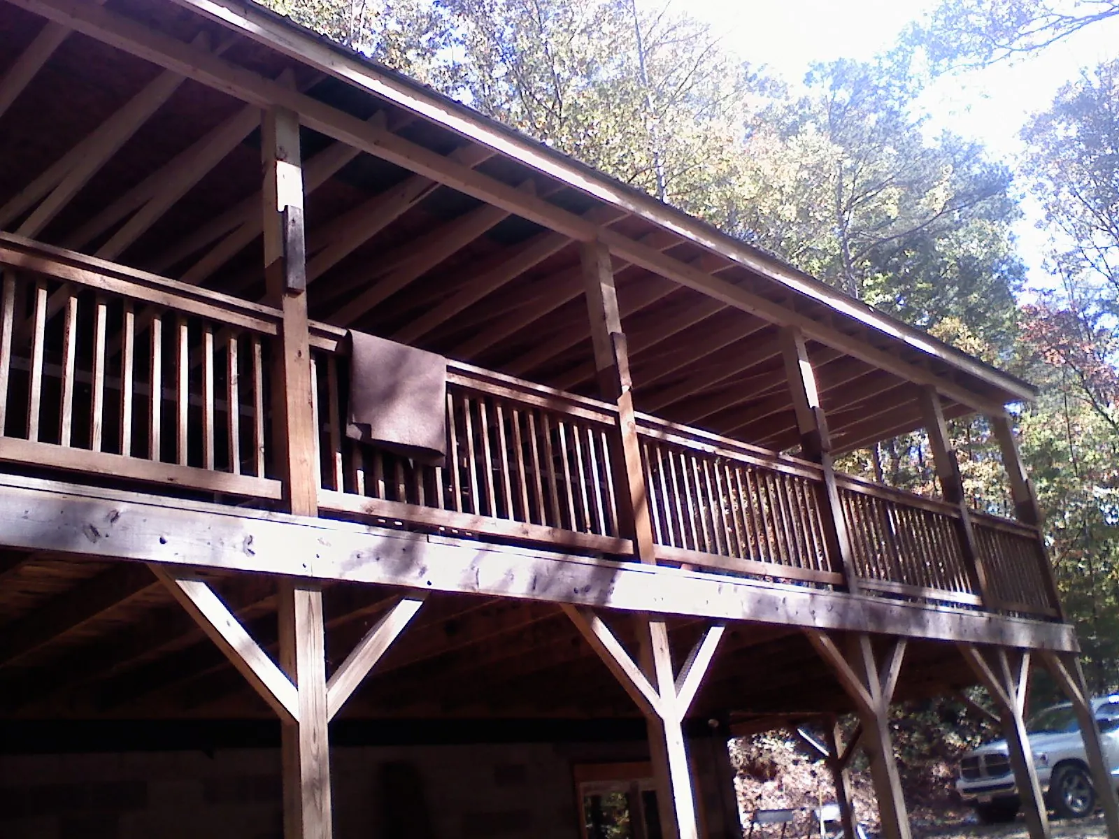 Timber framing under a new elevated porch and deck — Roof Leak Repair in Ronan by Roofing Brothers